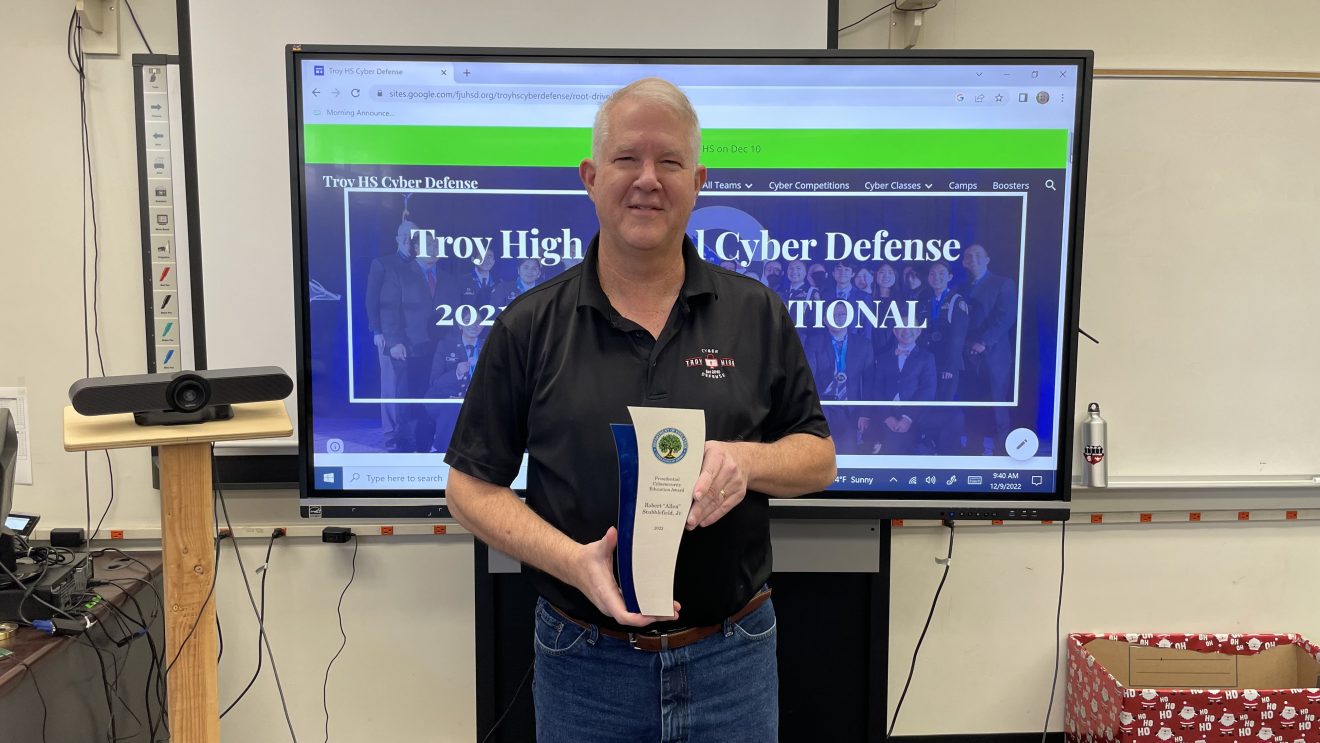 Allen Stubblefield with his Presidential Cybersecurity Education Award (Dec 1 2022)